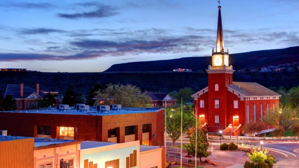 St. George Tabernacle at dusk with Pine Valley Mountains in the background — renters insurance in St. George, Utah