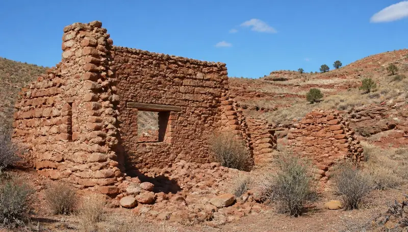 Stone ruins of the Silver Reef mining district above Leeds, Utah — health insurance and ACA Marketplace enrollment for Leeds, Utah 84746 households