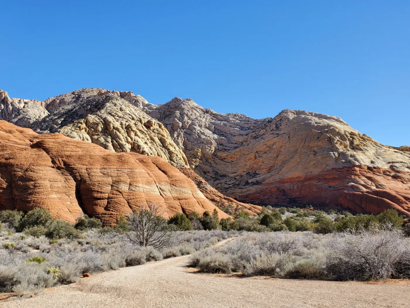 Red sandstone domes and white Navajo sandstone of the Snow Canyon area near Ivins, Utah