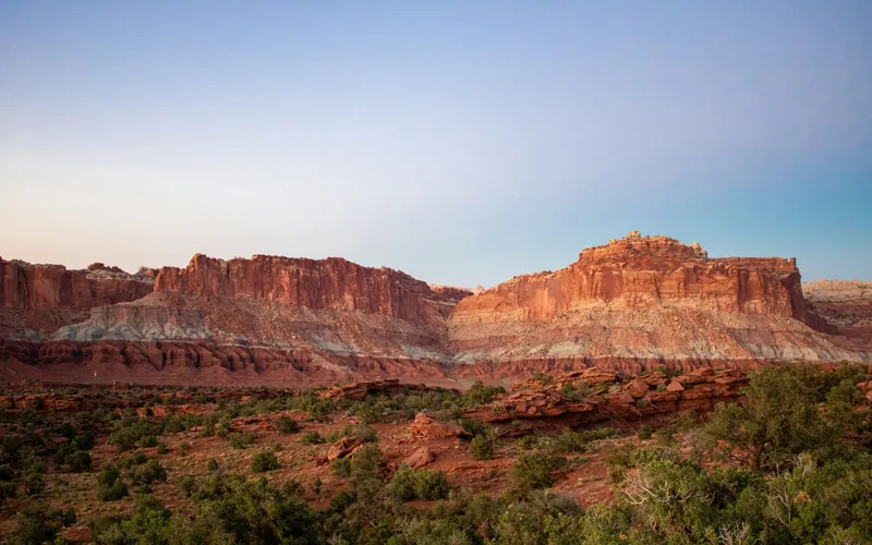 Layered red rock mesas at dusk in Kane County, Utah — the country where pre-Medicare retirees in 84741 bridge coverage to age 65