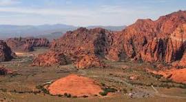 Red rock cliffs and desert landscape near St. George, Utah — the terrain local drivers navigate every day