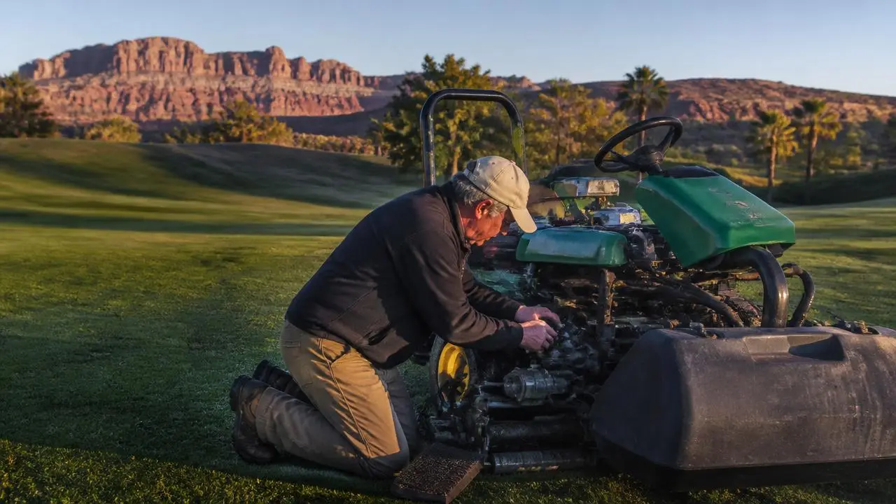 Golf course maintenance worker mowing a fairway near Mesquite, Nevada — business insurance, BOP, general liability and workers' comp for Mesquite, Nevada 89027 employers