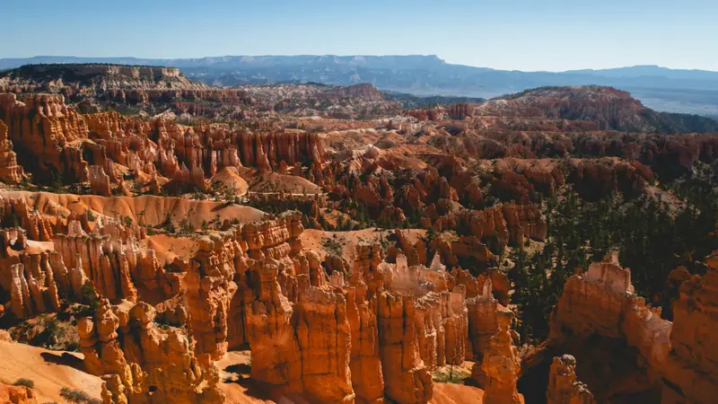 Red rock hoodoos and canyon formations east of Cedar City, Utah — Iron County health insurance for seasonal, hourly, and self-employed households