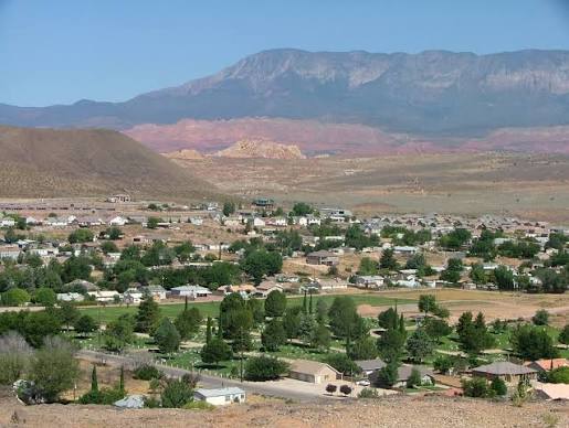 View of Hurricane, Utah neighborhoods nestled below the Pine Valley Mountains