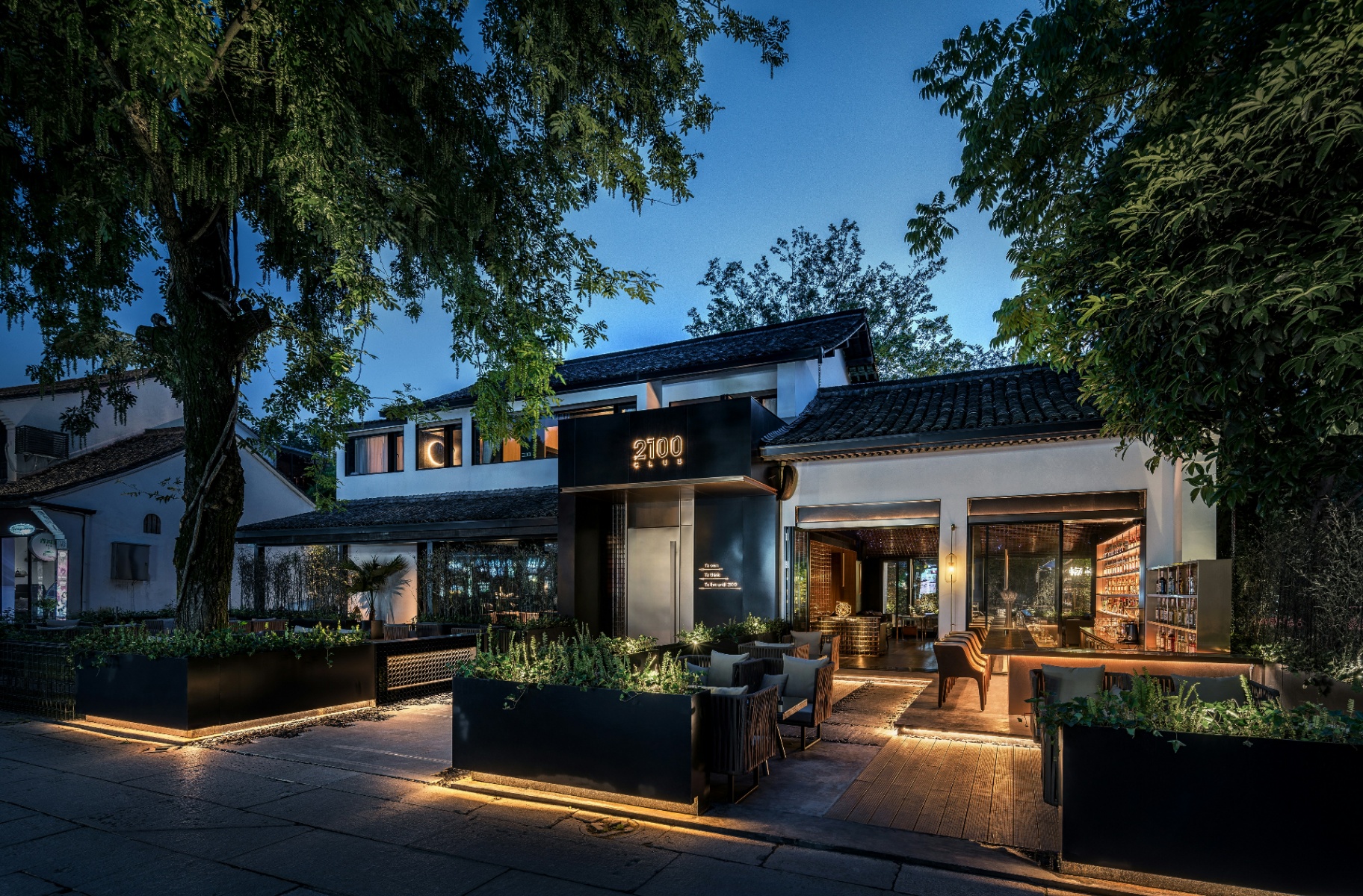 Warmly lit courtyard home at dusk — renters insurance in Toquerville, UT