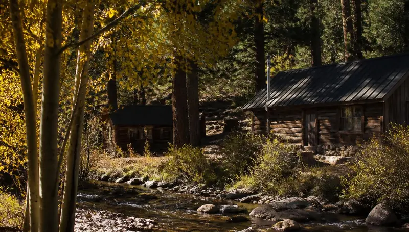 Wood cabins tucked under tall pines in Pine Valley, Utah — health insurance and ACA Marketplace enrollment for Pine Valley, Utah 84781 households