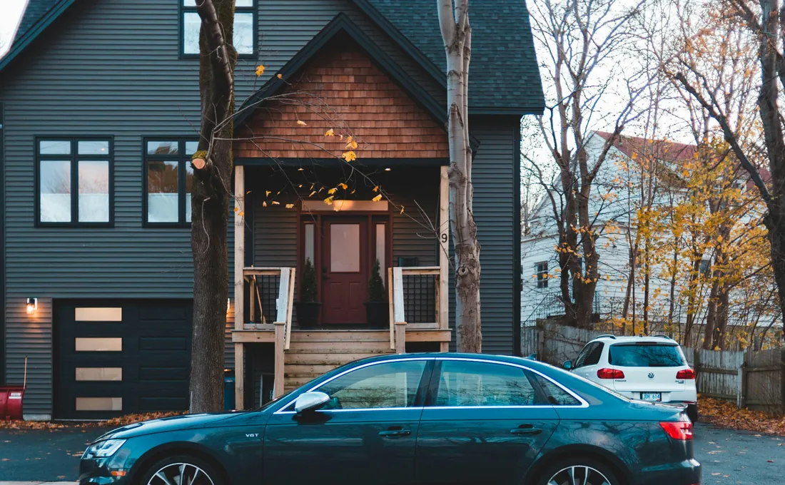 Car parked on the street in front of a rental home