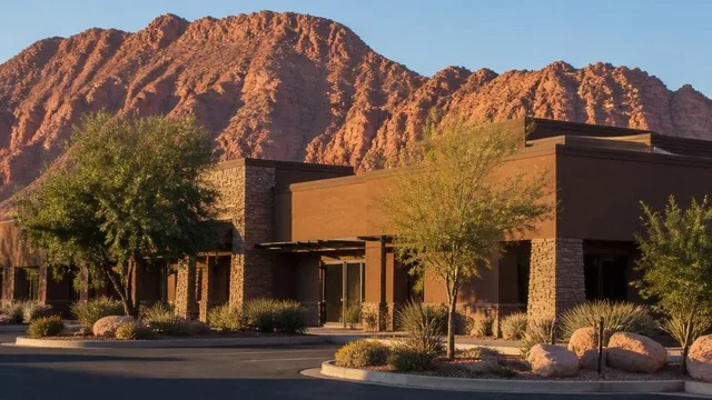 Desert business property below the red rock of Red Mountain in Ivins, Utah — local commercial insurance risk factors for Ivins, Utah 84738 businesses