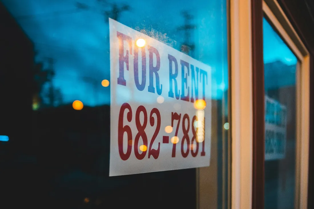 For Rent sign in a window at dusk — cheap renters insurance in St. George, Utah
