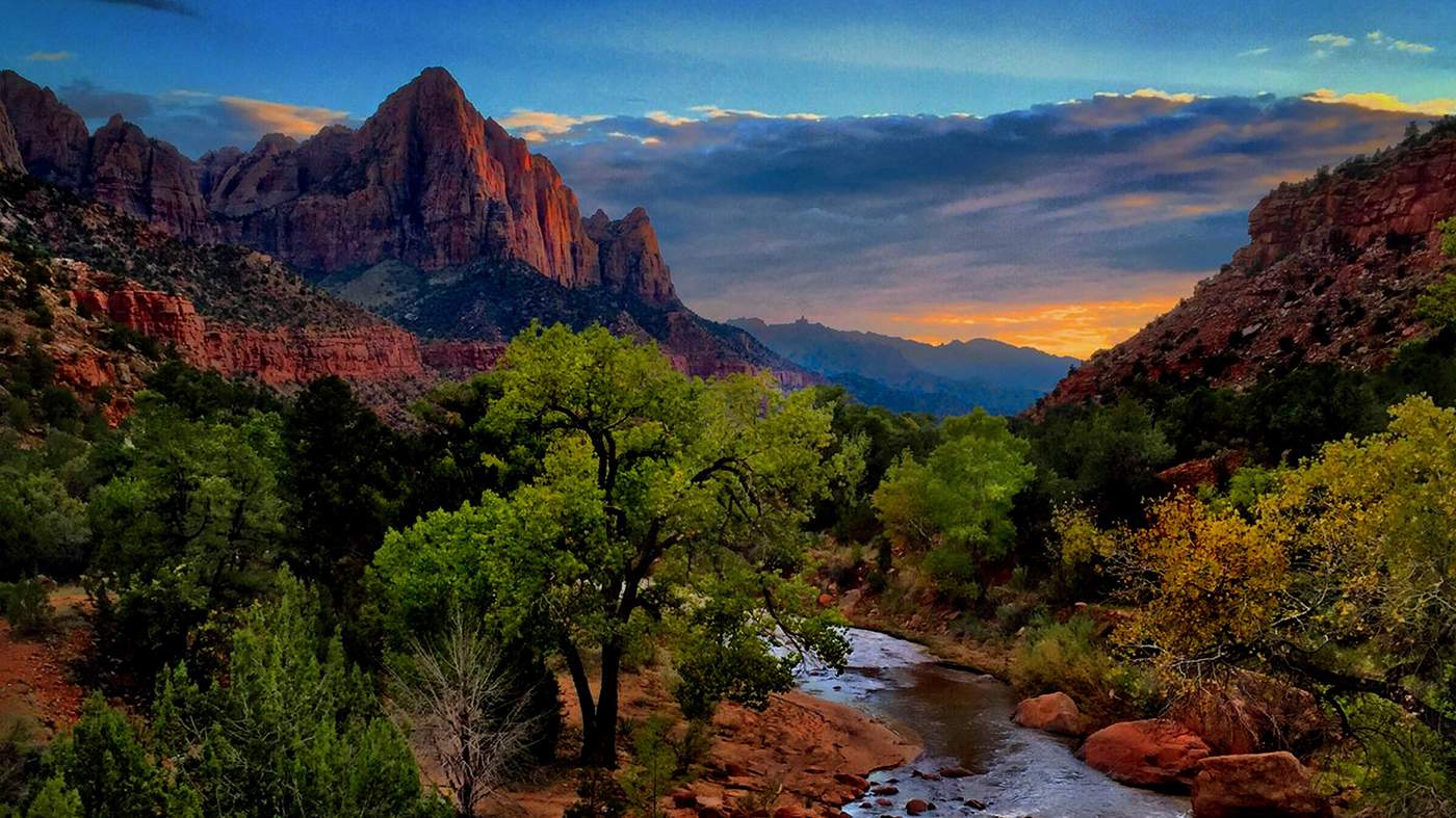 The Watchman peak at sunset above the Virgin River in Zion National Park — life insurance for Southern Utah families