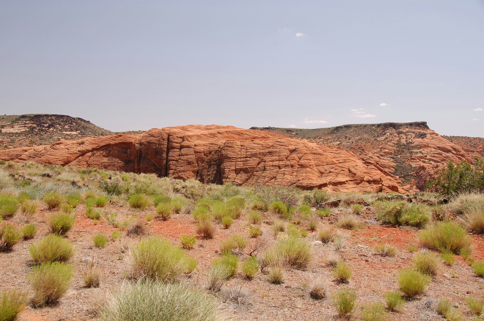 Red sandstone bluffs above Washington, Utah — renters insurance in Washington, UT