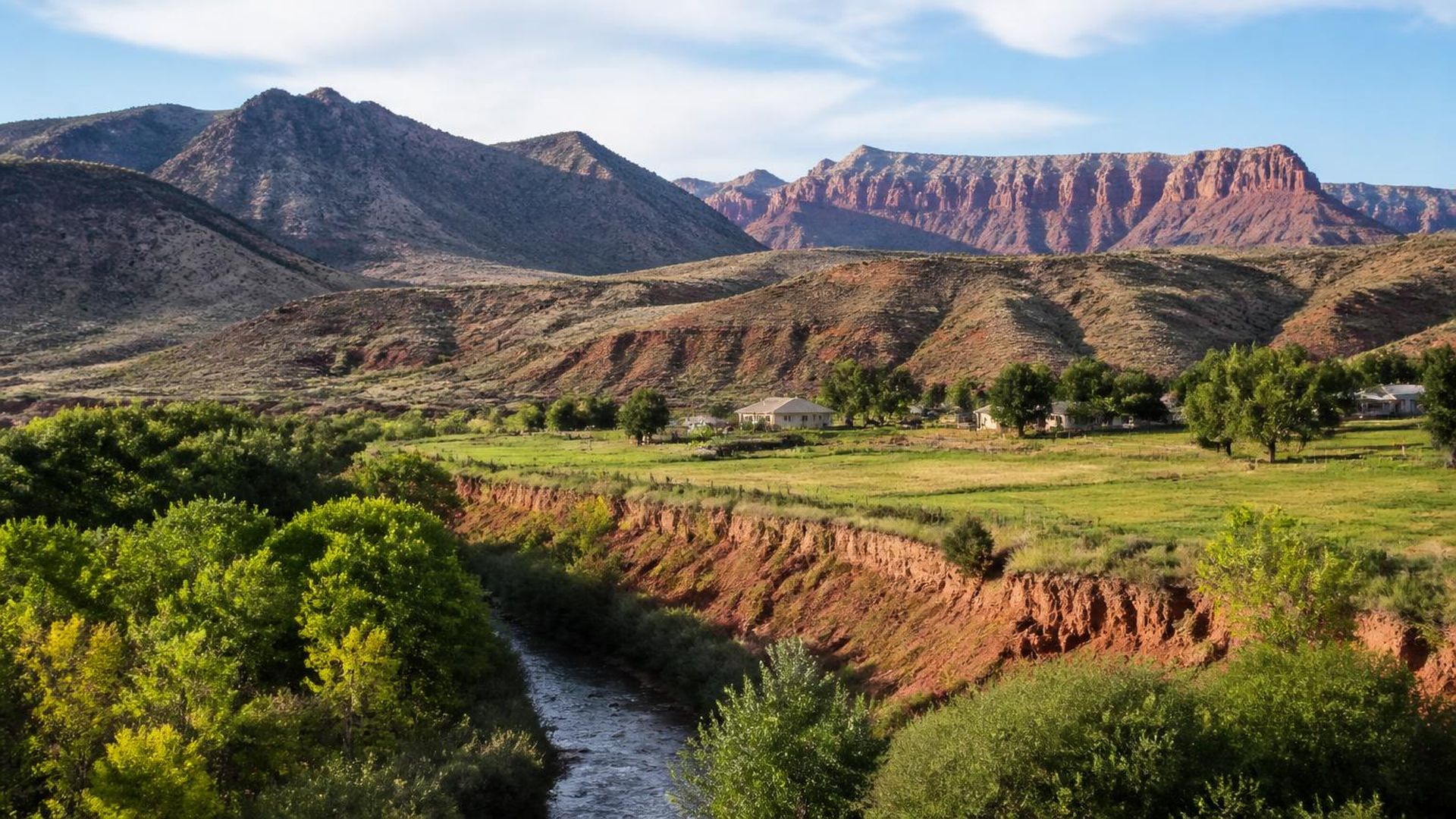 Pastures and homes on the bench above the Virgin River with red mesas beyond, Virgin, Utah (ZIP 84779) — ACA / Obamacare Marketplace health insurance, subsidies and off-Marketplace plans for Virgin, Utah households