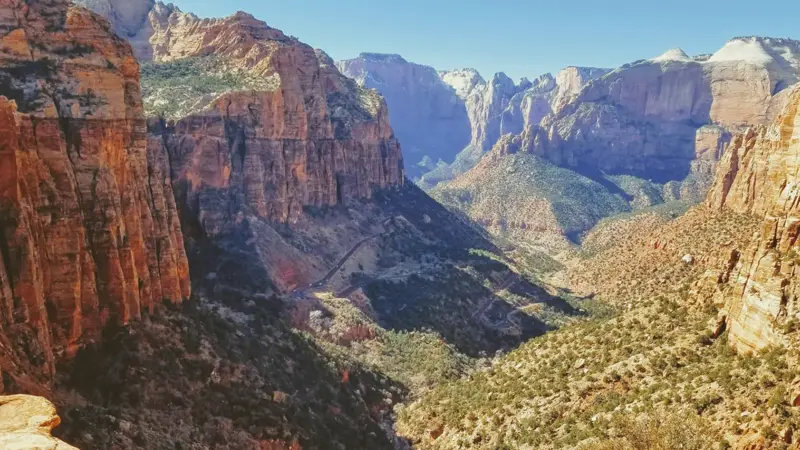 Zion canyon walls and the switchback highway east of La Verkin, Utah — the SR-9 corridor 84745 households drive for urgent care in Hurricane and specialists in St. George