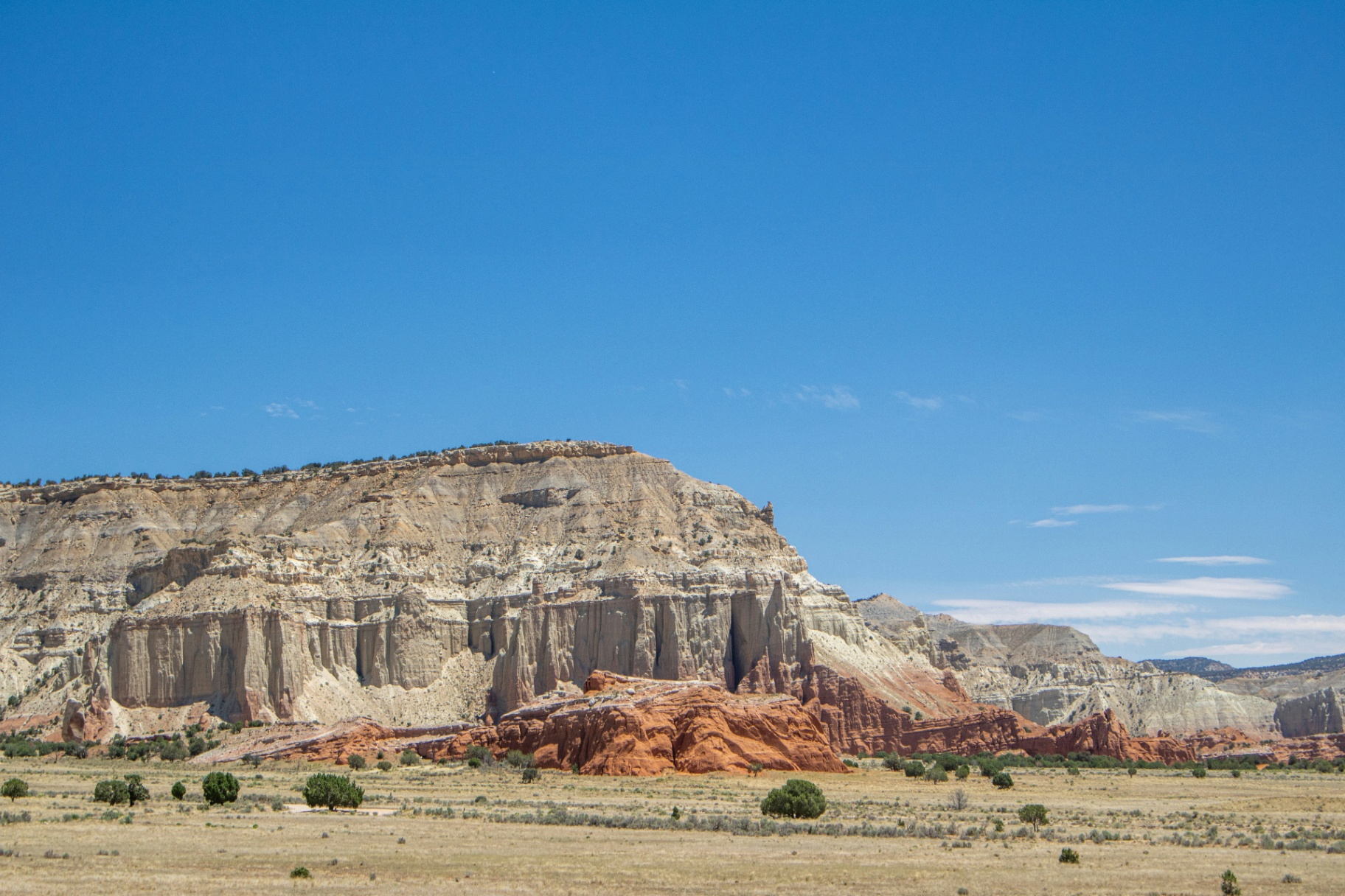 Red and white sandstone cliffs above Washington County, Utah