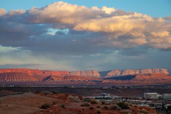 Sunset clouds over the red mesas above Hurricane, Utah