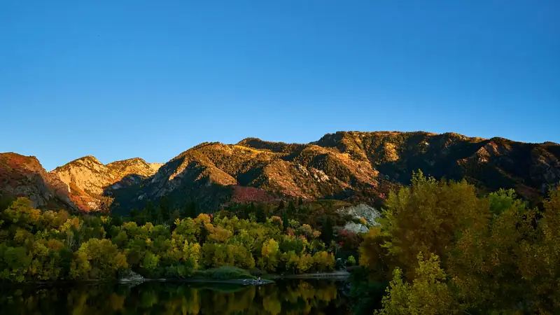 Autumn mountains reflected in a still alpine lake above Cedar City, Utah — ACA health insurance and Special Enrollment Periods for 84720 and 84721 households