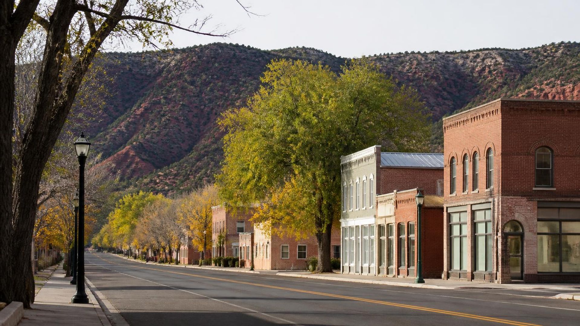 Historic brick storefronts and shade trees on the main street of Parowan, Utah (ZIP 84761) — ACA / Obamacare Marketplace health insurance, subsidies and off-Marketplace plans for Parowan, Utah households